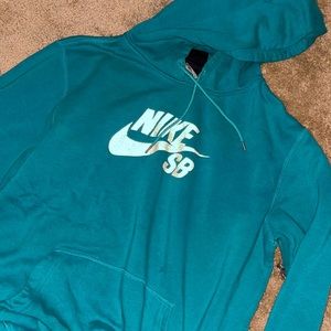 Nike SB hoodie with reflective Nike symbol